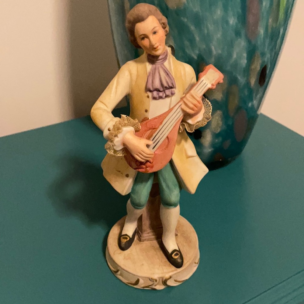 Norleans Japan figurine. Man playing mandolin. No chips, cracks, or fractures.